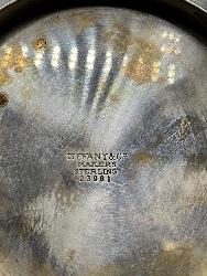 113607