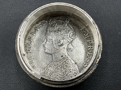 133457