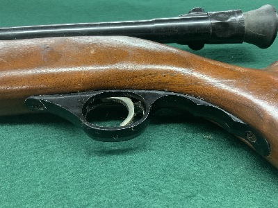 169245